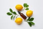 Fresh Lemon With Lemon Essential Oil Stock Photo