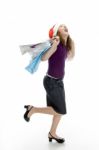 Cheerful Lady Holding Carry Bags Stock Photo