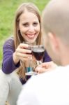 Young Romantic Couple Celebrating With Wine Stock Photo