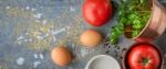 Ingredients For Baked Eggs With Tomatoes  On The Stone Table Wide Screen Stock Photo