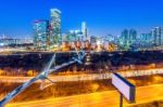 Traffic In Singil District, Seoul Korea Skyline At Night Stock Photo