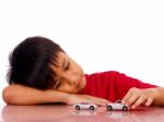 Young Boy With His Cars Stock Photo