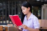 Asia Thai High School Student Uniform Beautiful Girl Read A Book Stock Photo