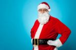 Aged Santa Posing With Hands On His Waist Stock Photo