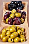 Variety Of Green, Black And Mixed Marinated Olives Stock Photo