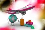 World Globe, An Airplane With A High Key Pile Of Luggage Stock Photo