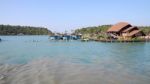 Home Of Villager And Fishing Farm On Tropical Sea Beach Stock Photo