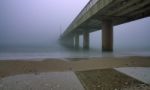 The Bridge In The Fog Stock Photo