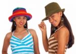 Teenage Girls Posing In Hats Stock Photo