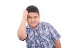 Frustrated Boy On White Background Stock Photo