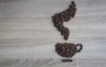 Flat Lay Of  Coffee Beans In Form Of Coffee Cup And Smell Smoke Stock Photo