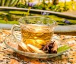 Tea On Patio Represents Fresh Ginger And Spices Stock Photo