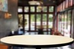 Selected Focus Empty Brown Wooden Table And Coffee Shop Or Resta Stock Photo