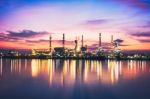 Sunrise Oil Refinery At Twilight In Bangkok, Thailand Stock Photo