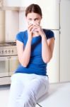 Woman Drinking A Cup Of Tea Stock Photo