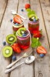 Red And Green Jelly Served With Fruit Stock Photo