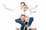 Cheerful Family Over White Background Stock Photo