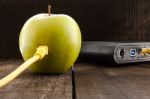 Green Apple Connected To A Data Network Stock Photo