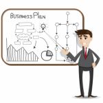 Cartoon Businessman Presentation With Business Plan Stock Photo