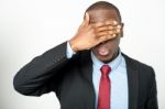 Business Executive Hiding His Eyes Stock Photo