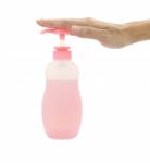 Hand Push Bottle Pump On White Background Stock Photo