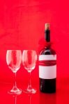 St Valentine's Setting With Present And Red Wine Stock Photo