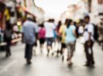 Blurred People Walking On The Street Stock Photo