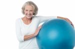 Senior Woman Posing With Exercise Ball Stock Photo