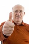 Old Man Showing Thumbs Up Stock Photo