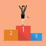 Business Woman Celebrates On Winning Podium Stock Photo