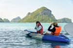 Mother And Daughter Take Pictures On Kayak Stock Photo