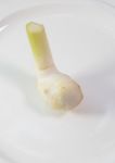 Close Up Of Galangal In Ceramic Dish Stock Photo