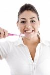 Young Woman Holding Toothbrush Stock Photo