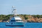 Fishing Boat Coming Into Porto Cervo Stock Photo