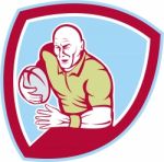 Rugby Player Running Charging Shield Cartoon Stock Photo