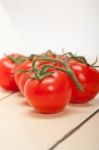 Fresh Cherry Tomatoes On A Cluster Stock Photo