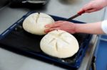 Hand Cutting Dough Stock Photo