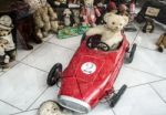 Teddy Bear Driving A Racing Car In A Shop Window In Vienna Stock Photo