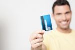 Handsome Man Holding Debit Card Stock Photo