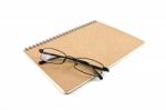 Notebook And Eyeglasses Stock Photo