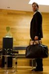 Business Man Standing In Lobby Stock Photo