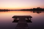 Lake Pier At Sunset Stock Photo