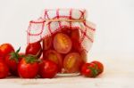 Artisanal Preparation Of Pickles Of Organic Cherry Tomatoes Stock Photo