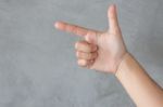 Hand Action Gesture On Grey Background Stock Photo