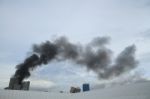 Black Smoke From Fire Burning On The Sky Stock Photo