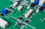 Electronic Circuit Board With Electronic Components Background Stock Photo