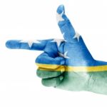 Solomon Islands Flag On Shooting Hand Stock Photo