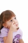 Small Child Scratching Her Nose Stock Photo