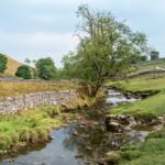 View Of The Countryside Around Malham Cove In The Yorkshire Dale Stock Photo