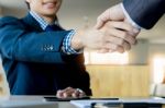 Two Confident Business Man Shaking Hands During A Meeting In The Stock Photo